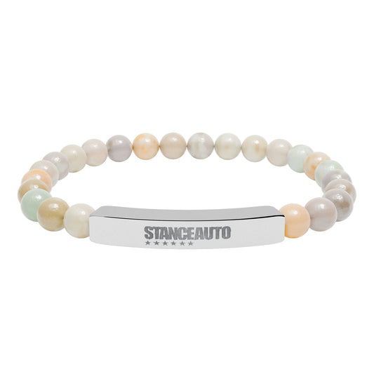 Bracelet Stance Auto Engraved Natural Stone Stretch Bar Bracelet featuring polished engraved centerpiece and natural stone beads.