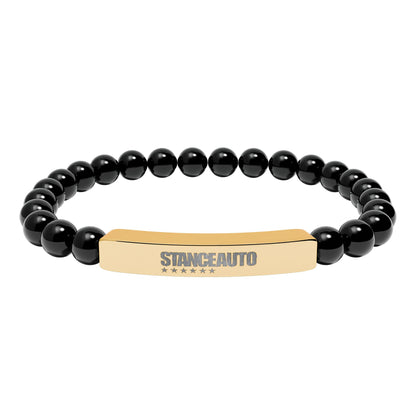 Brazalete elástico de piedra natural con barra y grabado automático "Stance"