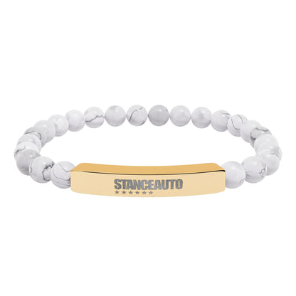 Brazalete elástico de piedra natural con barra y grabado automático "Stance"