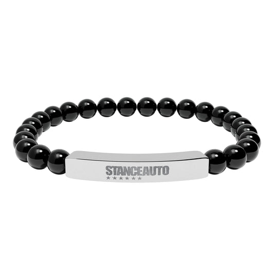 Bracelet Stance Auto Engraved Natural Stone Stretch Bar Bracelet made with black natural stone beads.